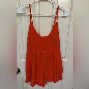 Orange romper dress with pockets